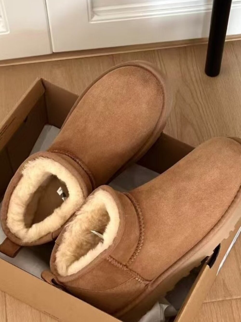 UGG Mini Booties in Chestnut Tan - Picture 4 of 7